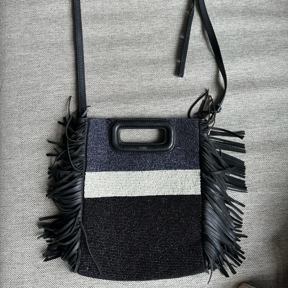 Classic Maje handle bag with beaded details.